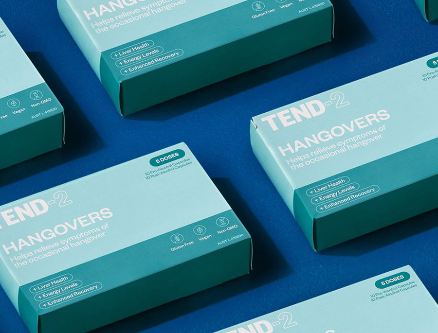 Tend-2 kit boxes photographed on a blue surface